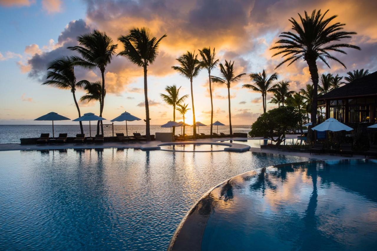 The Residence Mauritius Belle Mare Esterno foto Sunset at the Four Seasons Resort