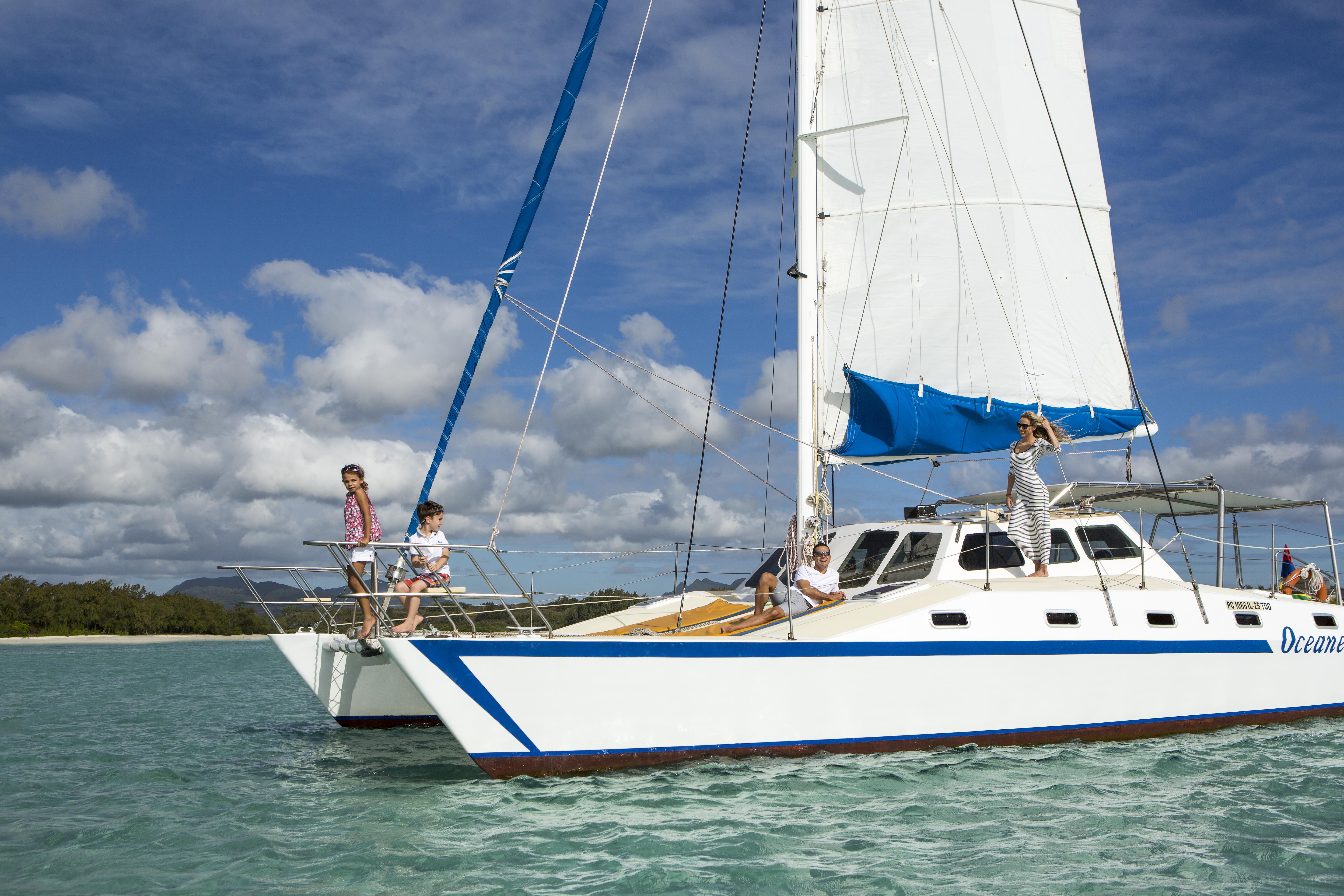 The Residence Mauritius Belle Mare Esterno foto A catamaran