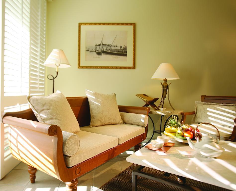 The Residence Mauritius Belle Mare Camera foto A living room